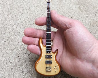 Miniature Bass Guitar - Personalized - Music gift (CBG18NW) Clay Guitar, Miniature Instruments, Bass Guitar Case, Modern Miniatures, Guitar Jewelry, Guitar Display, Miniature Guitars, Best Guitar Players, Acoustic Guitar Strings