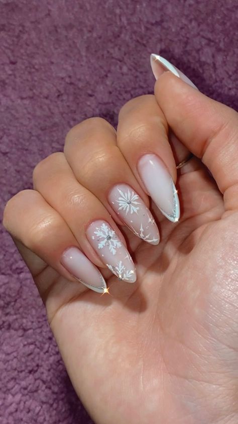 Festive White Nails, Snowflake Nails With Rhinestones, Snowflake Stiletto Nails, Almond Nails Snowflakes, Ice Princess Nails, Snow Themed Nails, Icicle Nails Acrylic, Sparkle Snowflake Nails, Snow Flake Nails Acrylics