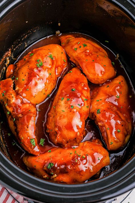 Slow Cooker Coca Cola Chicken - 🍗🙌🏻🎉 Saucy, juicy, sweet-yet-savory chicken that's so EASY and virtually work-free! Add just 6 ingredients to your Crockpot and let it do all the work! You'll be rewarded with chicken that's moist, tender, and an instant family FAVORITE! Leftover chicken is always handy to have on hand and great for meal prep, in wraps, or on sandwiches. Crock Pot Suppers, Coca Cola Chicken, Barbecue Sauce Chicken, Cola Chicken, Barbecue Chicken Recipe, Easy Slow Cooker Chicken, Savory Chicken, Chicken Slow Cooker Recipes, Juicy Chicken