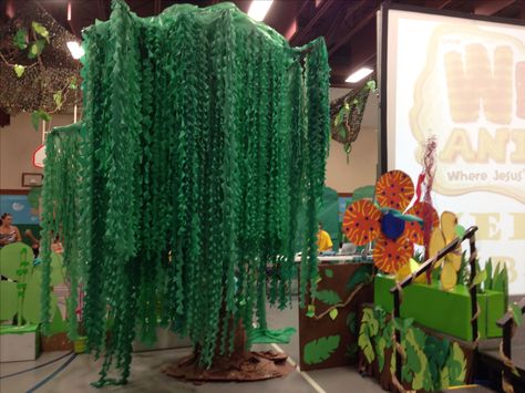 Our tree made from green plastic tablecloth materials. Weird Animals Vbs, Decoration Birthday Party, Fiesta Tropical, Jungle Birthday, Vbs Crafts, Jungle Party, Safari Party, Plastic Tablecloth, Plastic Tables