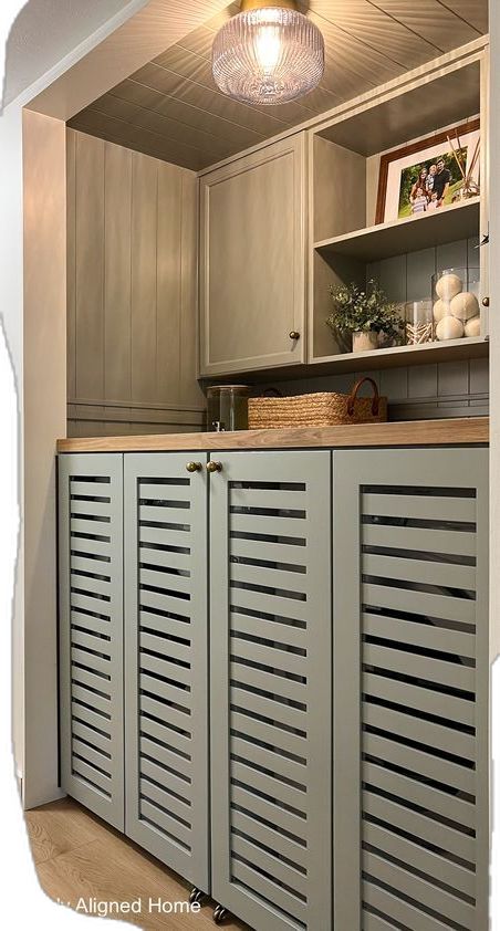 Small Laundry Room Closet, Pigeon Paint Color, Laundry Room Upgrade, Farrow And Ball Pigeon, Hidden Laundry Rooms, Compact Laundry Room, Laundry Closet Makeover, Laundry Nook, Hidden Laundry