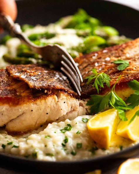 Crispy Skin Barramundi served with easy No-Stir Creamy Lemon Risotto Barramundi Fillet Recipe, Barramundi Recipes, Baked Salmon And Asparagus, Lemon Risotto, Creamy Mashed Cauliflower, Cod Fish Recipes, Seared Fish, Cook Fish, Recipetin Eats