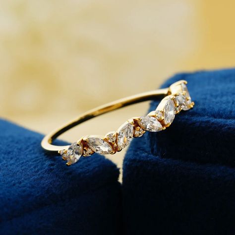 Shop @ sarlyn.com Elevate your love story with the Aarika Lab Grown Marquise Diamond Half Eternity Solid Gold Wedding Band. Beyond a ring, it's a symbol of everlasting commitment and modern elegance. Embrace the allure of the marquise cut! 💍💖 #AarikaWeddingBand #LabGrownDiamonds #MarquiseElegance Price: $671 Key Features: Lab Grown Marquise Diamonds 💎✨ Solid Gold Craftsmanship 🌟🔒 A Half Eternity Band with Marquise Brilliance 💫🌸 Visit our website at aarikajewels.com and let this exquisite b... Solid Gold Wedding Band, Round Moissanite Engagement Ring, Yellow Gold Wedding Band, Moissanite Diamond Rings, Colorless Diamond, Half Eternity Band, Classic Engagement Rings, Moissanite Wedding Bands, Round Moissanite