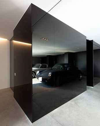 Great black mirror wall. Find more ideas on our blog.http://yam.st/y7t8 #contemporaryinteriors #garage Garage Mirror, Black Mirror Wall, Black Mirrors, Tinted Mirror, Luxury Garage, Black Wall Mirror, Modern Garage, Solar Panels For Home, Mirrored Wall