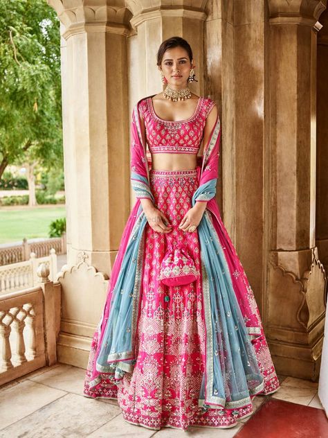 Gorgeous hot pink lehenga with blue dupatta. See more on wedmegood.com  #wedmegood #indianwedding #indianbride #lehenga #lehengacholi #bridallehenga #bridallehengacholi #pink #blue Lehenga Color Combinations, Orang India, Indian Outfits Lehenga, Lehnga Dress, Bridal Lehenga Collection, Designer Bridal Lehenga, Indian Bridal Lehenga, Anita Dongre, Gaun Fashion