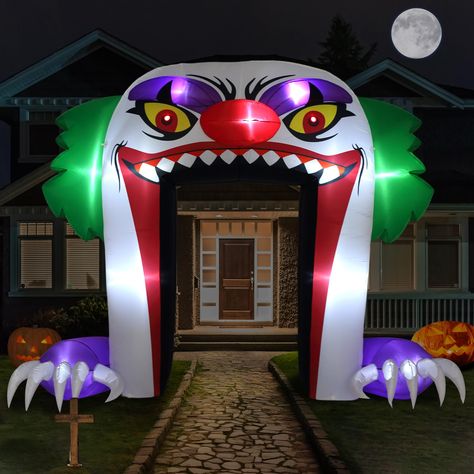 PRICES MAY VARY. Welcoming Spooky Delight: Get ready to enter the realm of Halloween fun with a hauntingly hilarious entrance. 10-foot large Halloween inflatable clown with a wide open mouth and large pointy claws adds an extra touch of Halloween spirit to your outdoor decorations. Weatherproof Fun Round The Year: Equipped with an upgraded IP68 waterproof fan, the creepy clown archway inflatable decor is completely protected from dust, rain, and even snow. Seasons will change, but the Halloween Archway Outdoor, Halloween Arch, Lawn Party Decorations, Halloween Blow Ups, Halloween Clown, Inflatable Decorations, Halloween Inflatables, Yard Decorations, Scary Clowns