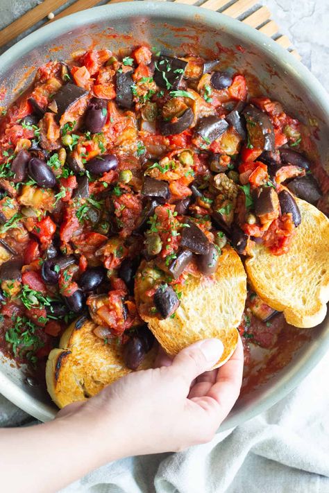 Eggplant caponata is an easy Sicilian appetizer that's full of flavor. It's vegan and you can serve it as a healthy dip with some crusty bread. It's a great addition to the dinner table and takes less than an hour to make. Serve caponata warm or cold, as an appetizer or a flavorful side dish! Italian Eggplant Recipes, Vegetarian Eggplant Recipes, Eggplant Caponata Recipe, Vegan Eggplant Recipes, Caponata Recipe, Eggplant Recipes Easy, Eggplant Caponata, Eggplant Recipe, Eggplant Dishes