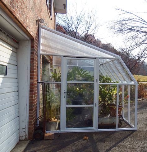 Garage-side sunroom add-on #Sunroomidea #Sunroom Garage To Sunroom Conversion, Sunroom Add On, Add On Sunroom, Attached Greenhouse Sunroom Conservatory, Prefab Sunroom, Diy Sunroom On A Budget, Attached Greenhouse Sunroom Bohemian, Plant Sunroom, Diy Sunroom