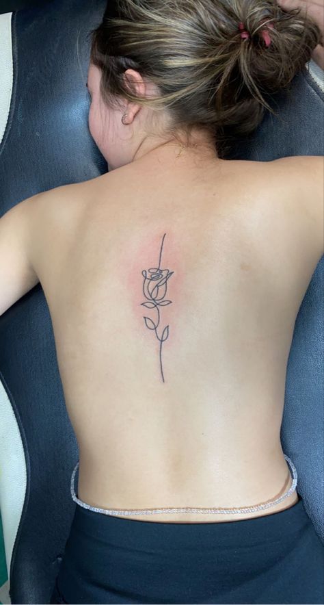 Single line rose spine tattoo Back Tattoo Women Rose, Back Rose Tattoo, One Line Rose Tattoo, Rose Back Tattoo, Line Rose Tattoo, Rose Tattoo On Back, Beautiful Back Tattoos, Minimal Tattoo Designs, Sugar Skull Tattoo