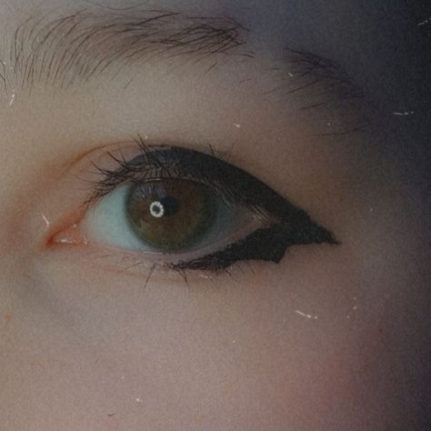 close-up photo of a brown eye with downwards pointing bat wing eyeliner with a grainy vintage filter over the image Bat Winged Eyeliner, Bat Wings Eyeliner, Bat Wing Makeup, Ghost Eyeliner, Batwing Eyeliner, Bat Stamp, Bat Wing Eyeliner, Bat Eyeliner, Ghost Concert