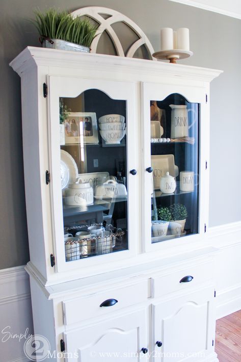 How to Style A Farmhouse China Cabinet with Rae Dunn Pottery | Simply2moms White Wood Wall Decor, China Cabinet Decor, Farmhouse China Cabinet, China Cabinet Redo, China Cabinet Makeover, Hutch Ideas, Painted China Cabinets, Summer Tiered Tray, Redo Cabinets