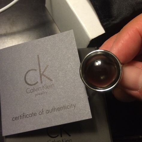 Ring Calvin Klein ring. Size 9 brand new. Comes in its original package. Gray color and silver. Calvin Klein Jewelry Rings Calvin Klein Ring, Calvin Klein Jewelry, Ring Color, Jewelry Ring, Womens Calvin Klein, Gray Color, Calvin Klein, Jewelry Rings, Ring Size