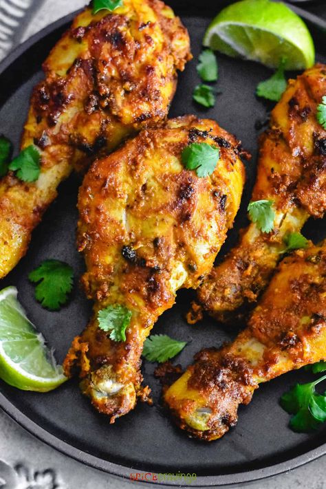 An easy tandoori chicken recipe with chicken marinated in an authentic yogurt-spice blend and baked or grilled until juicy and crisp. #tandoorichicken Tandoori Chicken Instant Pot, Indian Drumstick Recipes, Indian Chicken Wings, Tandori Spice Chicken, Indian Chicken Marinade, Easy Tandoori Chicken Recipe, Air Fryer Tandoori Chicken, Chicken Recipe Air Fryer, Tandoori Chicken In Oven