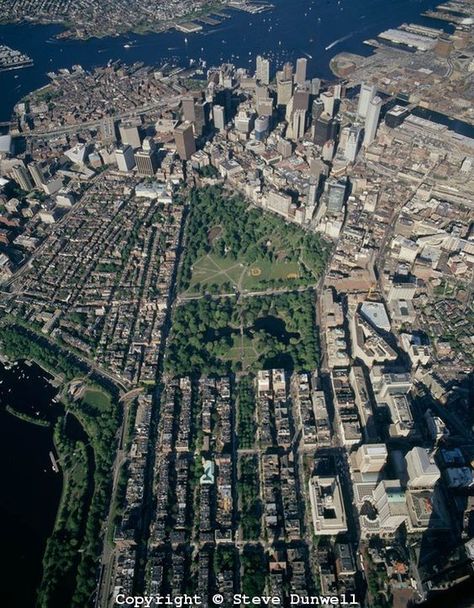 Aerial view above Boston's Back Bay looking east toward the Public Garden, Boston Common, Downtown, and the Waterfront. At left: the Charles River, the Esplanade, Beacon Hill, the West End, North Station, Government Center and the North End. At left: Copley Square, Bay Village, the Theater District, Leather District, Chinatown, Financial District, Fort Point Channel, and the Seaport District. Across Boston Harbor are parts of Charlestown (left) and East Boston. (Photo by Steve Dunwell) Boston Architecture, Boston History, Emerson College, Boston Skyline, Boston Mass, Boston Things To Do, Boston Common, Boston Harbor, House Deco