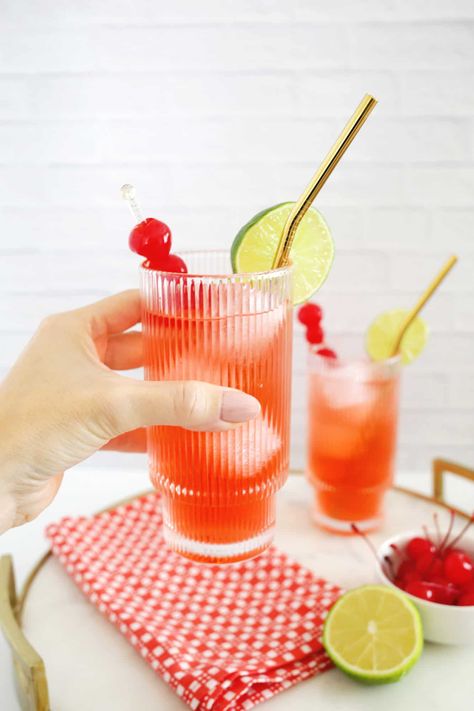 Classic Shirley Temple Drink Recipe (with Variation Options!) - A Beautiful Mess Childhood Snack Recipes, Shirley Temple Mocktail, Nostalgia Recipes, Childhood Recipes, Shirley Temple Recipe, Mocktail Drink, Shirley Temple Drink, Fruity Alcohol Drinks, Boozy Popsicles