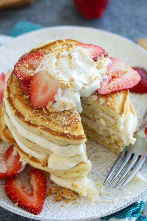 Pancakes for breakfast or dessert! These fluffy Cheesecake Pancakes are topped with a cream cheese frosting for a fun and delicious treat. Stuffed Cheesecake Pancakes, Cream Cheese Pancake Topping, Cream Cheese Topping For Pancakes, Cream Cheese Stuffed Pancakes, Cheesecake Pancakes Recipe, Pancakes Cream Cheese, Cheesecake Pancakes, Fluffy Cheesecake, Cream Cheese Pancakes