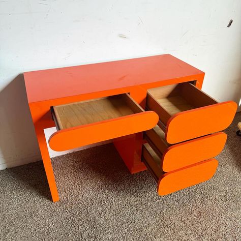 Add a vibrant splash of color to your workspace with this Postmodern Orange Lacquer Writing Desk. Featuring a striking orange laminate… | Instagram Funky Desks, Oakland Apartment, Computer Writing, Writing Materials, Turtle Soup, Colorful Desk, Bold Aesthetic, Writing Desks, Bedroom Orange