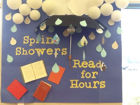 April Showers Read For Hours Bulletin Board, April Showers Bulletin Board Ideas, Spring Library Bulletin Board Ideas, Spring Reading Bulletin Boards, Spring Book Display, Reading Bulletin Boards Elementary, Library Sayings, School Library Book Displays, Book Bulletin Board