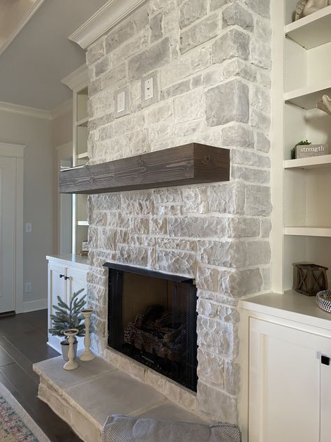 Stone Fireplace With Crown Molding, Stacked Stone Electric Fireplace, Stone Fireplace Floor To Ceiling With Built Ins, Interior Stone Fireplace, Gas Fireplace With Hearth, Stone Over Brick Fireplace, Fireplace With Ledge, Small Stone Fireplace, Foyer Transformation