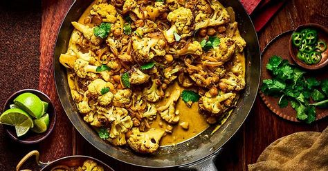 Roasted cauliflower & chickpea coconut curry Cauliflower Chickpea Curry, Roasted Cauliflower Chickpea, Cauliflower And Chickpea Curry, Cauliflower Chickpea, Chickpea Coconut Curry, Vegetarian Nutrition, Eat Less, Ras El Hanout, Cauliflower Curry