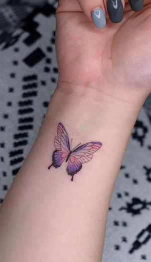 77 Beautiful Butterfly Tattoos - Plus Their Meaning & Photos Small Colourful Butterfly Tattoo, Ombre Butterfly Tattoo, Colourful Butterfly Tattoo, Pink Butterfly Tattoo, Colored Butterfly Tattoo, Watercolor Butterfly Tattoo, Colorful Butterfly Tattoo, Purple Butterfly Tattoo, Butterfly Tattoo Stencil