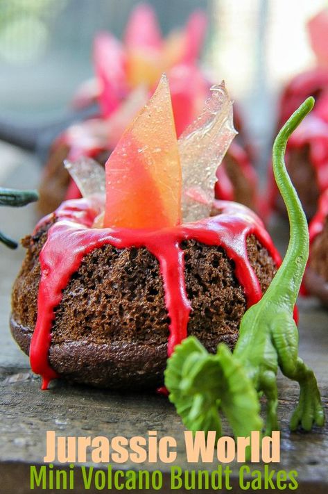 Jurassic World Mini Volcano Bundt Cakes Recipe #dinosaur #dessert #kids Mini Volcano Cakes, Volcano Bundt Cake, Volcano Cupcakes, Mini Volcano, Movie Night Snack Ideas, Volcano Birthday, Snacks Party Ideas, Dinosaur Snacks, Night Snack Ideas