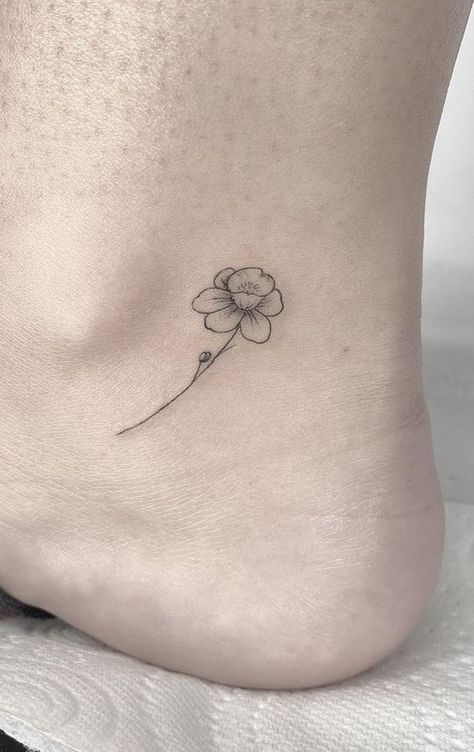 Daffodil And Ladybug Tattoo, Jonquils Tattoo, Daffodil Tattoo Birth Flower, Micro Daffodil Tattoo, Daffodil Jonquil Tattoo, Tiny Daffodil Tattoo Simple, Daffodil Tattoo Wrist, Daffodil With Butterfly Tattoo, Minimalist Narcissus Tattoo