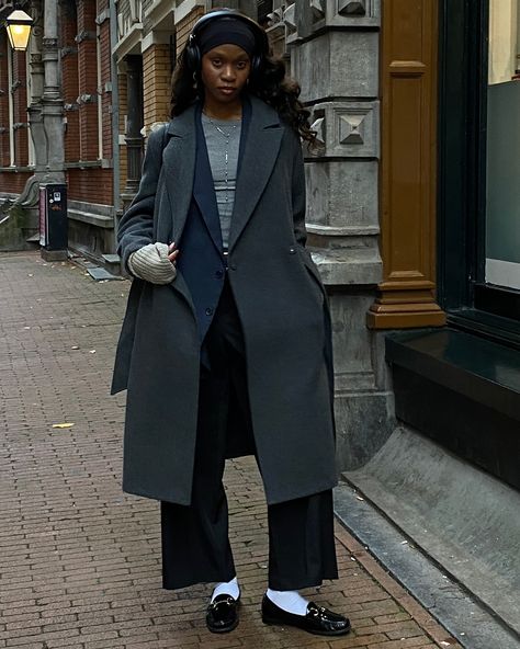 Grace in every stride, sophistication in every detail. #effortlesslychic #amsterdamstreetstyle #effortlesschic #layeredlook #fallfashion #coatseason #loafersandsocks #MinimalistStyle #cityvibes #headphonechic #chic #elegance #europeanstyle #modernclassic #streetfashion #timeless #layers #outfitinspo Amsterdam Street Style, Loafers And Socks, Effortless Chic, Layered Look, European Fashion, Modern Classic, Minimalist Fashion, Autumn Fashion, Street Style