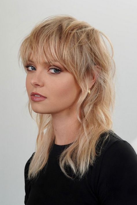 Top Ten Summer Hair Trends To Watch 2021 Midlength Shag Mullet, Miley Mullet, Edgy Shag Haircut With Bangs, Wolf Cut With Micro Bangs, 80s Shag Haircut, Mullet Long Hair, Edgy Shag Haircut, Mullet Haircut Woman, Blonde Shag