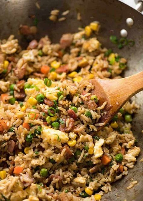 Close up of Egg Fried Rice in a wok with a wooden spoon, fresh off the stove Takeout Recipes, Tin Eats, Making Fried Rice, Egg Fried Rice, Chinese Cooking Wine, Sauce For Rice, Pork Stir Fry, Arroz Frito, Recipetin Eats