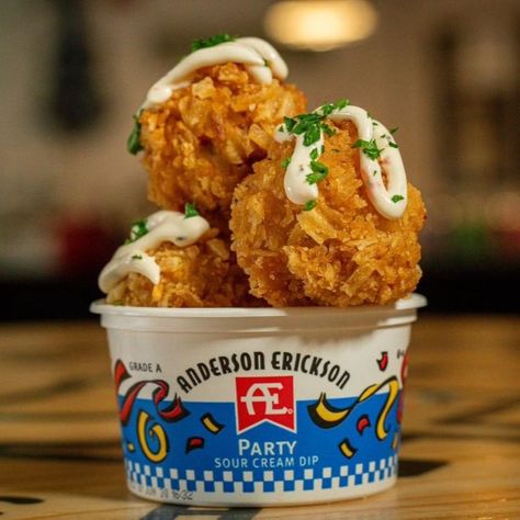 Raise your hand if you’re going to the Iowa State Fair. Raise your other hand if you’re going to try AE Party Dip Party Balls. Both hands in the air? Now wave them like you just don’t care because it’s time to party! You'll find these (one of the top 11 new fair foods for 2024) at JR's South Pork Ranch. 🎉 Only 21 days and we’ll see you at the fair! #AEPartyDip #AEPartyDipPartyBalls These hand-made shredded potato, cheese, and bacon balls are stuffed with AE Party Dip and rolled in crunchy pot... State Fair Party, Bacon Balls, Dip Party, Fair Foods, Potato Cheese, Iowa State Fair, Party Dip, Party Dips, Hands In The Air