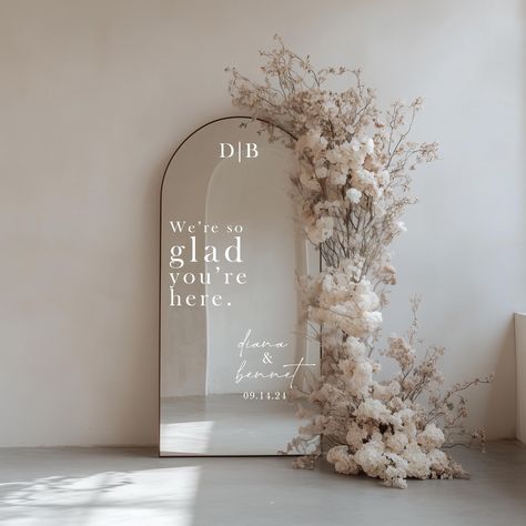 Personalized Wedding Selfie Mirror Vinyl Decal. You will receive the vinyl decal with message "We're so glad you're here" and your personal details. The lettering will look exactly as shown in photos.  Decal can be applied to mirrors, acrylic, glass or wood. Large decals will come in multiple pieces to make it easier to apply. TO ORDER: Measure your mirror/surface without the frame. Width is measured from left to right; height is measure from top to bottom. Select the width size of your mirror f Wedding Selfie Mirror, Mirror Wedding Signs, Wedding Vinyl, Wedding Selfie, Wedding Entrance Sign, Personalized Wedding Stickers, Mirror Vinyl, Custom Mirror, Wedding Mirror