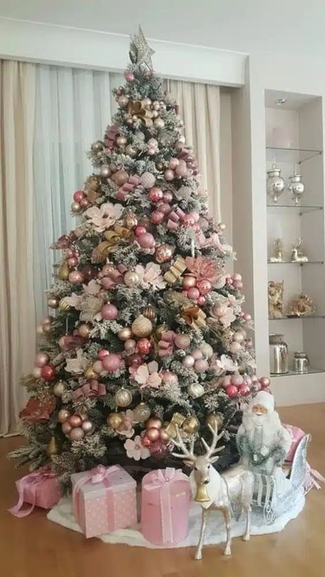 31 Christmas Tree Decorating Ideas in 2024: Nailing the Festive Fiasco Christmas Trees Pink And Gold, Pink Decorated Christmas Tree, Pink Ornaments Christmas Tree, White And Pink Christmas Tree, Elegant Christmas Tree Decorations, Gold Christmas Tree Decorations, Pretty Christmas Decorations, Diy Christmas Tree Topper, Christmas Tree Decorating Themes