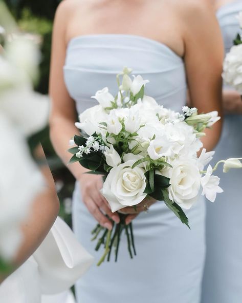 This wedding featured the brightest blooms and the sweetest bride and groom. 💞 We used a mix of white orchids, roses, peonies, campanula, and more to create this hand-tied and foam free cascading bouquet for our bride. The bridesmaids had smaller, standard versions of her bouquet. The whole day was just gorgeous! More to come… 🤍 Photography@brandisisson Planning: @hankalevents Venue: @sacredheartaugusta Floral Design: @honeycombflorals Beauty: @aklandco Catering: @berrys.catering Ren... White Bridesmaid Bouquet, Bridesmaid Bouquet White, Cascading Bouquet, White Bridesmaid, Roses Peonies, Floral Bridesmaid, White Bride, Cascade Bouquet, Bride Flowers