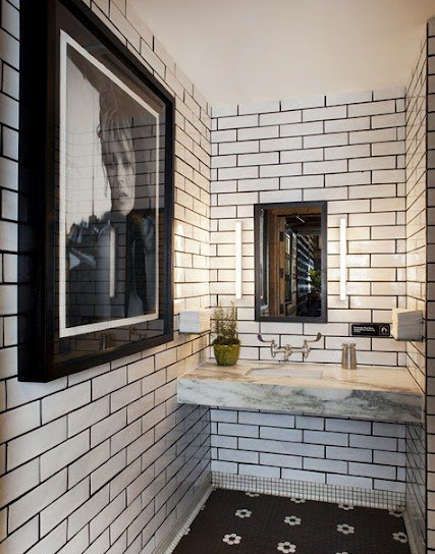 restaurant bathroom with dark-grouted white subway tile and a black and white hex tile floor Black And White Tile, Black Grout, Restaurant Bathroom, Subway Tiles Bathroom, White Bathroom Designs, White Subway Tiles, White Subway Tile, Black Tiles, Trendy Bathroom