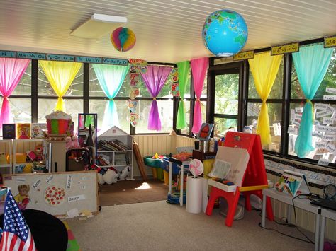 Our classroom....needs more candy for the "candy land " feel, but the curtains give a good start. Curtains are made from plastic table cloths held up with simple tension rods!! Classroom Window Decorations, Candy Theme Classroom, Classroom Curtains, Classroom Window, Curtain Tracks, Classroom Layout, Candy Theme, New Classroom, Class Decoration