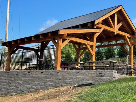 The retaining wall is part of the patio pavers under the pavilion which will soon continue onto the pool decking as well. Rv Pavilion Ideas, Camper Port, Rv Homestead, Rv Covered Parking, Breezeway Garage, Camper Decks, Camper Porch, Rv Port, Rv Deck