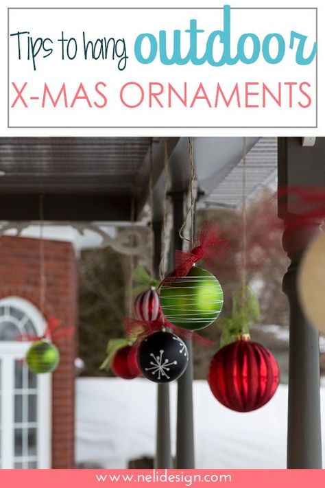 Find out the best kept secret to hang Christmas ornaments outside. Easy hang Christmas decoration outdoor without damaging your home. #christmasdecor #outsidedecor #decorations Front Porch Christmas Decor Large Ornaments, Ornaments For Outside Trees, Front Porch Christmas Hanging Ornaments, Hanging Ornaments Front Porch, Hanging Christmas Decorations Outdoor, Hanging Ornaments On Tree, Ornaments Hanging From Ceiling, Outdoor Christmas Tree Ornaments, Outdoor Hanging Ornaments