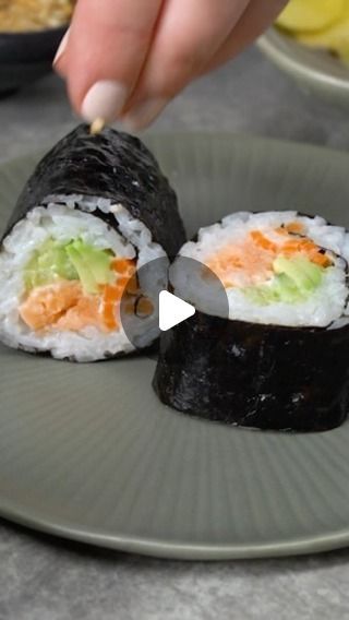 Martha Stewart on Instagram: "These cooked sushi rolls are a fun way to enjoy homemade sushi. We use baked salmon with rice, sliced carrots, cucumber, and avocado wrapped in nori seaweed sheets, creating a colorful dinner—sans raw fish. Rolling the sushi takes practice but has delicious rewards. It’s also something kids can do (and enjoy!)—they might even be better at it than the adults. Get the recipe at the link in our bio." Sushi Without Raw Fish, Cooked Sushi Rolls, Salmon With Rice, Cooked Sushi, Colorful Dinner, Sliced Carrots, Avocado Wrap, Salmon Roll, Raw Fish