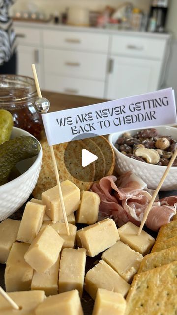 Jill Williams + Christin | Your Friend’s Friends on Instagram: "SAVE for your next par-TAY 🪩💋🧀 [and happy #ttpd day!]

this @taylorswift cheese board was the perfect way to celebrate jill’s cousins “new era”! she is recently divorced + the fam rallied behind her with a swiftie themed weekend.

if there’s anyone who can get you through a breakup - it’s taylor [and cheese].

ps: we totally messed up the last flag but you get the idea. it should say “i can make the bad guys gouda for the weekend” so don’t @ us - we are tired. 
•
•
#taylorswift #swifties #swiftie #ttpd #theerastour #erastour #divorce #divorcedmom #charcuterie #charcuterieboard #cheeseboard #cheeseboardsofinstagram" Breakup Party Ideas Friends, Taylor Swift Themed Charcuterie Board, Taylor Swift Cheese Board, Divorce Party Food Ideas, Breakup Party Ideas, Taylor Swift Charcuterie Board Ideas, Taylor Swift Charcuterie Board, Taylor Swift Party Food, Divorce Celebration Ideas