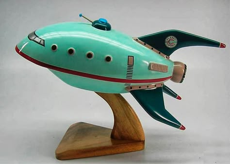 Classic streamlined rocket toy - Dark Roasted Blend: Glorious Retrofuture from… Atomic Space Age, Retro Rocket, Retro Robot, Space Toys, Atomic Age, Vintage Space, Design Industrial, Vinyl Toys, Futurama