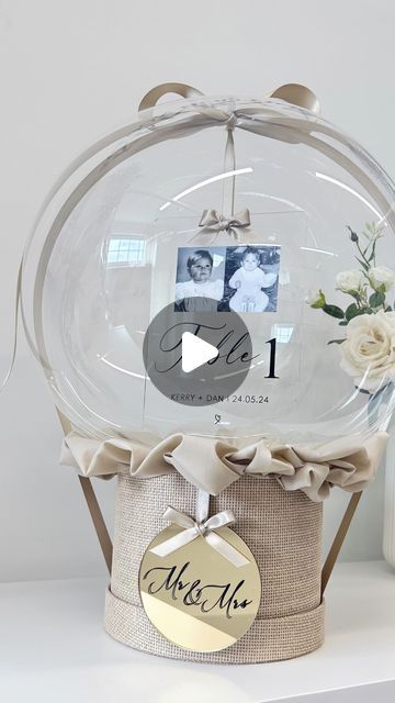 Kerry Heider on Instagram: "Wedding season is in full swing and I’m here for it! 

Table number balloons isn’t something I’ve seen before and it’s been rattling around in my head for months! Capture your precious photos and combine them into your wedding table numbers 😍 These can be suited to your chosen colour scheme!

Full tutorial pending upload to my academy 7th June 🥰

#wedding #weddingdecor #centerpeices #weddinginspo #baby #balloons #balloon #balloondecor #weddinginspiration #tablenumbers #southampton #uk #ukshipping #taylorswift #balloonartist #artist #balloonstylist #balloondecor @cricut_uk  @cricut @teckwrapcraft @theeventcollectivex" Ballon With Pictures Attached, Clear Balloons Wedding, Clear Balloon Wedding, Balloon Centrepiece Wedding, Bobo Balloon Wedding Gift, Ballon Helium, Balloon Pictures, Clear Balloons, Big Balloons