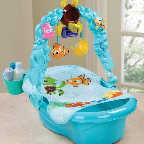 FINDING NEMO Fun Tub | Disney Baby.... I thought this was so cute so I figured i'd pin it in your board even if it isn't baby shower-ish. lol. Finding Nemo Nursery, Nemo Nursery, Nemo Baby Shower, Finding Nemo Baby, Nemo Baby, Baby Tub, Labrador Puppies, Baby Bath Tub, Baby Minnie