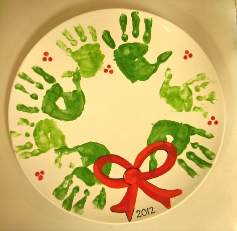 Handprint wreath painted pottery Diy Christmas Plate, Handprint Wreath, Christmas Handprint Crafts, Christmas Handprint, Handprint Christmas, Footprint Crafts, Christmas Crafts For Toddlers, Fun Christmas Crafts, Handprint Crafts