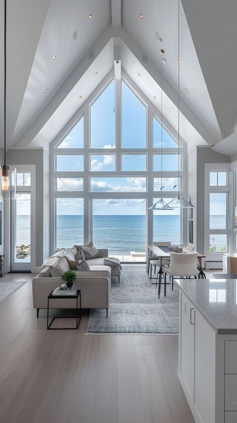 Stylish beachfront home with ocean view, high ceilings, large windows, chic décor, and indoor-outdoor living concept Modern Cabin Interior, Minimalist Furniture Design, Beachfront Home, Christmas Wallpaper Backgrounds, Minimalist Furniture, Bed Linens Luxury, Modern Cabin, High Ceilings, Large Windows