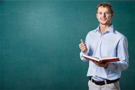 Young male teacher standing with book | Premium Photo #Freepik #photo #professor-teachers #professor #student-studying #lesson Teacher Pose Reference, Teacher Pose, Teacher Man, Male Teachers, Teacher Photo, Summer Promotion, Male Teacher, Ramadan Quotes, Light Background Images