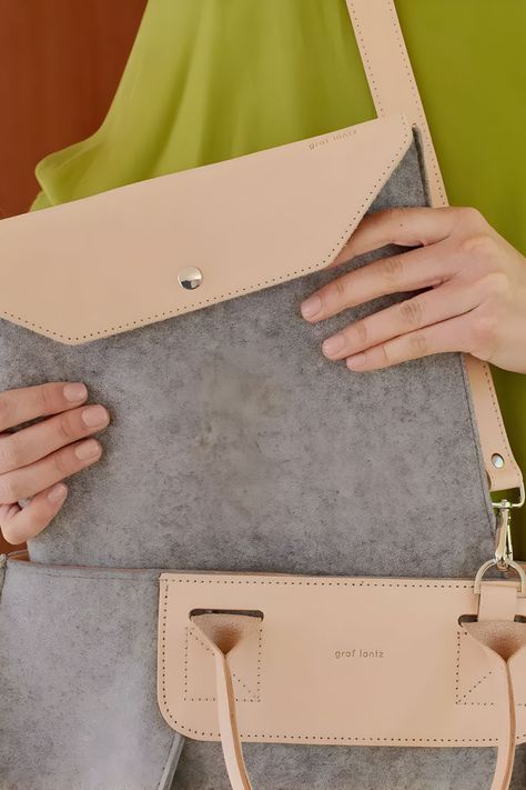 Crafted from stain-resistant, sustainable Merino wool felt, this sleeve offers premium protection for your 13" laptop. 🌿✨ Experience elegance and eco-friendliness combined in this sleek and durable accessory. Find out the Graf Lantz guide on Marmalade and gift the ideal blend of luxury and sustainability this holiday season. 🎄💻💫 #LaptopSleeve #HolidayGift #TechGiftIdeas #GrafLantz Tech Gift, Computer Sleeve, Holiday List, Tech Savvy, Gadget Gifts, Holiday Wishes, Tech Gifts, Marmalade, Laptop Computers