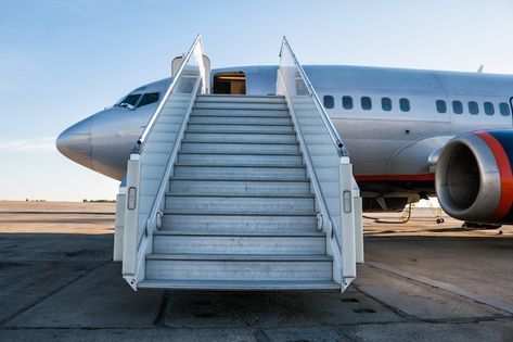 Passenger aircraft with a boarding ramp ... | Premium Photo #Freepik #photo #airplane-aircraft #aircraft #jet-plane #aviation Airplane Backdrop, Aviation Party, Airlines, Passenger, Apron, Aircraft, My Saves, Photography