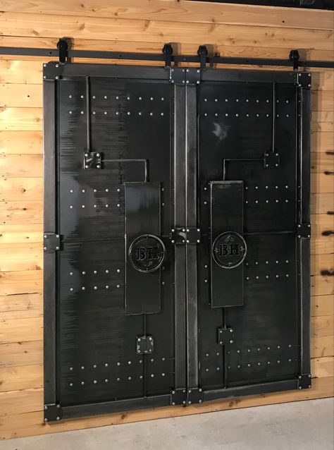 Built these replica “vault doors” barn doors for a Brew House in Idaho. They are heavy steel construction, non functioning vault mechanisms.. nostalgia only! They are functioning barn doors. Come check me out on Etsy! Barn Door Sliders, Vault Doors, Industrial Style Decor, Door Art, Entryway Mudroom, Metal Barn, Metal Clock, Casa Container, Art Department