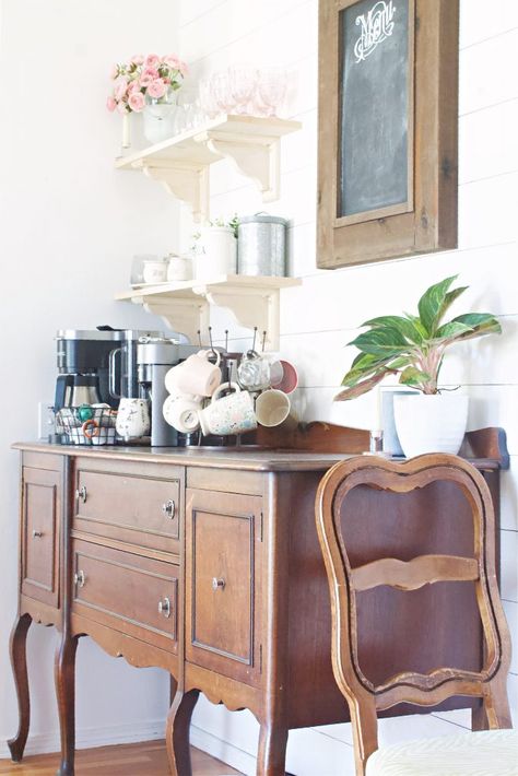 Coffee is very important in our home. So, we needed an area dedicated to our vital morning brew. This coffee bar refresh did the trick! Coffee Bar Traditional, Coffee Bar Sitting Room, Shelving Above Coffee Bar, Traditional Coffee Bar Ideas, Vintage Buffet Coffee Bar, Mirror Above Coffee Bar, Coffee Dresser Bar, Antique Dresser Coffee Bar, Grand Millennial Coffee Bar